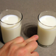 Illustration for article titled Astounding: 7 Incredible Photos Of Hands Pointing To Glasses Of Milk With Their Ring Fingers